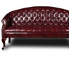 A Classic Traditional Button Tufted Loveseat flanked by two matching armchairs, all with elegant wooden legs.