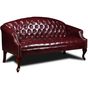 An elegant Classic Traditional Button Tufted Sofa with tufted upholstery and wooden legs.