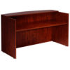 A TOS Reception Desk, 71W X 30/36D X 42H, Cherry with a broad top surface, open shelf in the middle, and solid side panels.