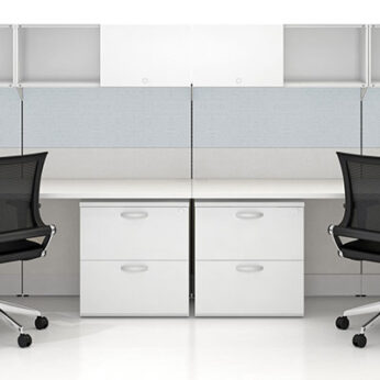 A modern office workspace featuring two Interra Series chairs, white desks and cabinets, set against a clean, white background.