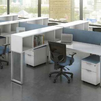 Modern office space with several Elements Series Desks with floor supported Hutch, each featuring a desk, chairs, and shelves, set against large windows overlooking a cityscape.