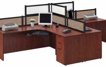 Modern office cubicle setup featuring 2 Desk Collaborative Unit with Dividing Panels, partitioned by black dividers, and equipped with computers, phones, and office supplies.