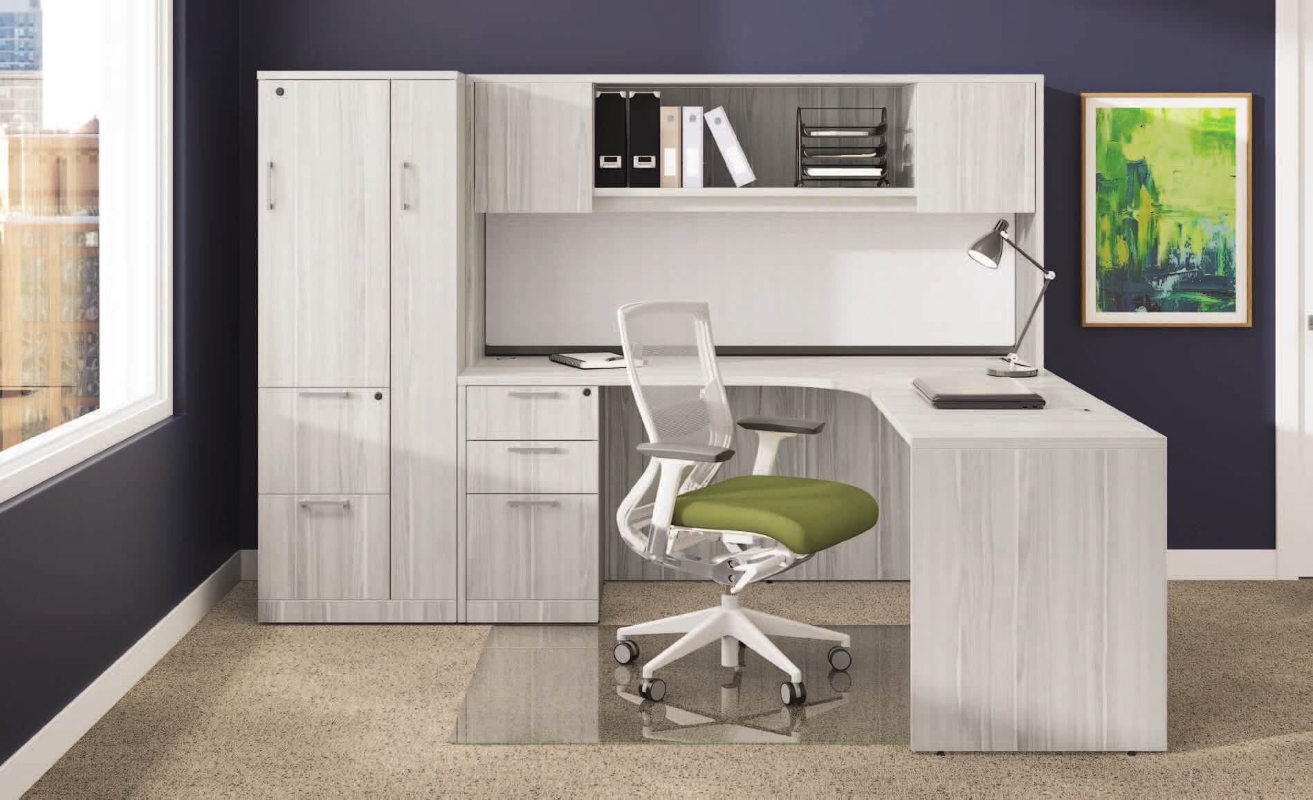 Modern office desk with green chair.